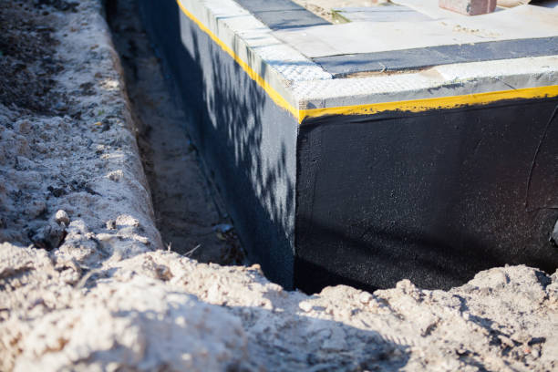 Professional Exterior Waterproofing technician working in Batavia, NY